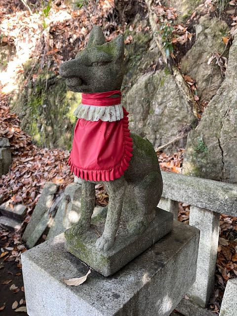 A statue in a Japanese Shrine depicting a fox spirit